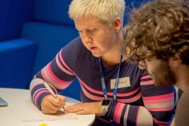 People working together on making public services.