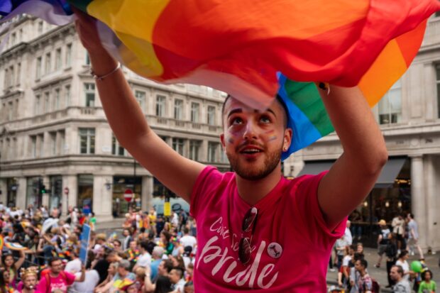 A photo of an civil servant celebrating at a pride event.