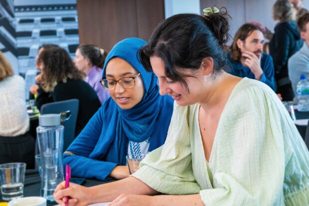 People participating in an event about public services.