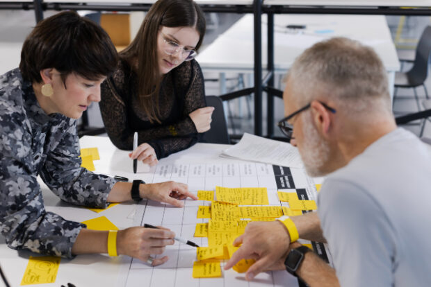Designers in a workshop at a conference.