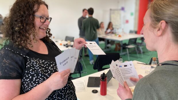 A photo of government officials participating in a workshop